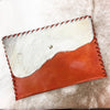Leather + Cowhide Clutch